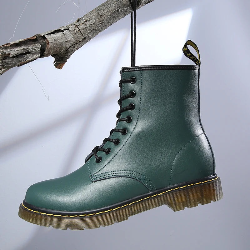 Women's lace-up combat boots with round toes and chunky ribbed soles