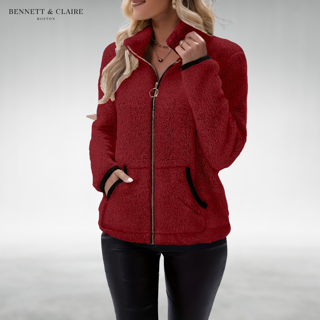 Women's textured fleece jacket with raised collar, zip front and black-trimmed pockets