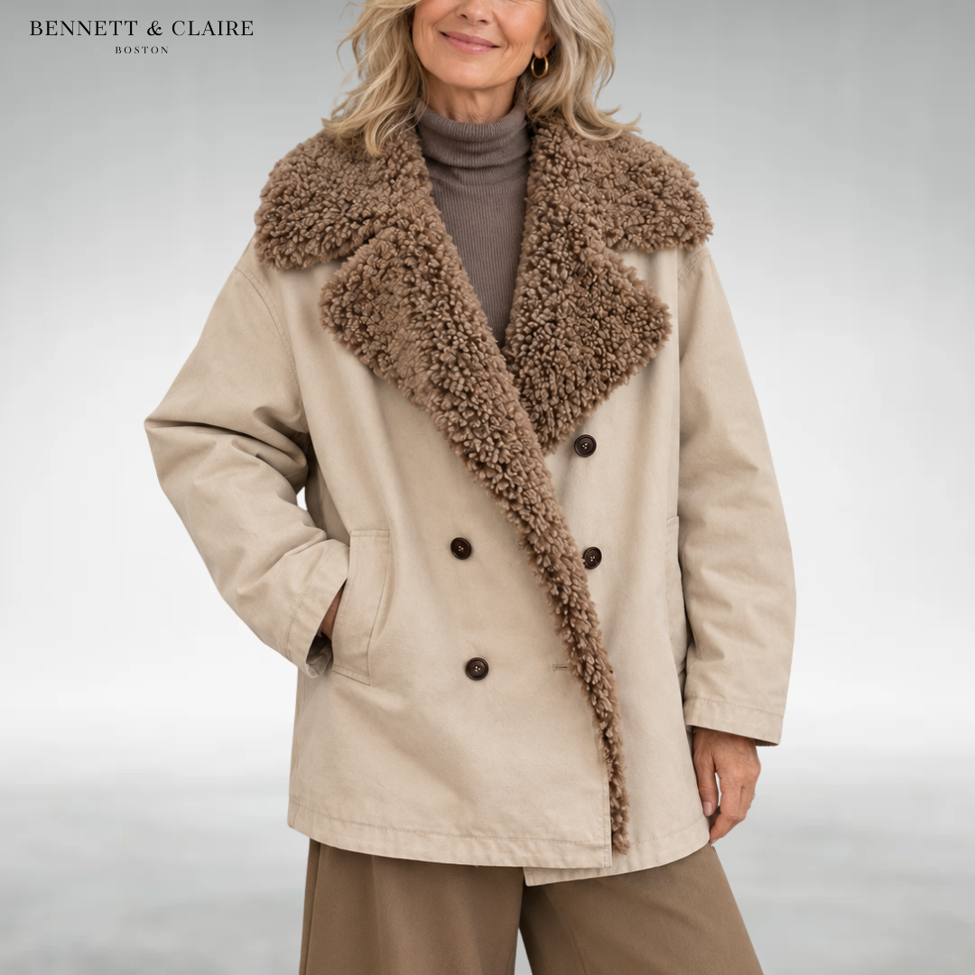 Women's beige coat with a large textured collar, long sleeves, buttons and front pockets
