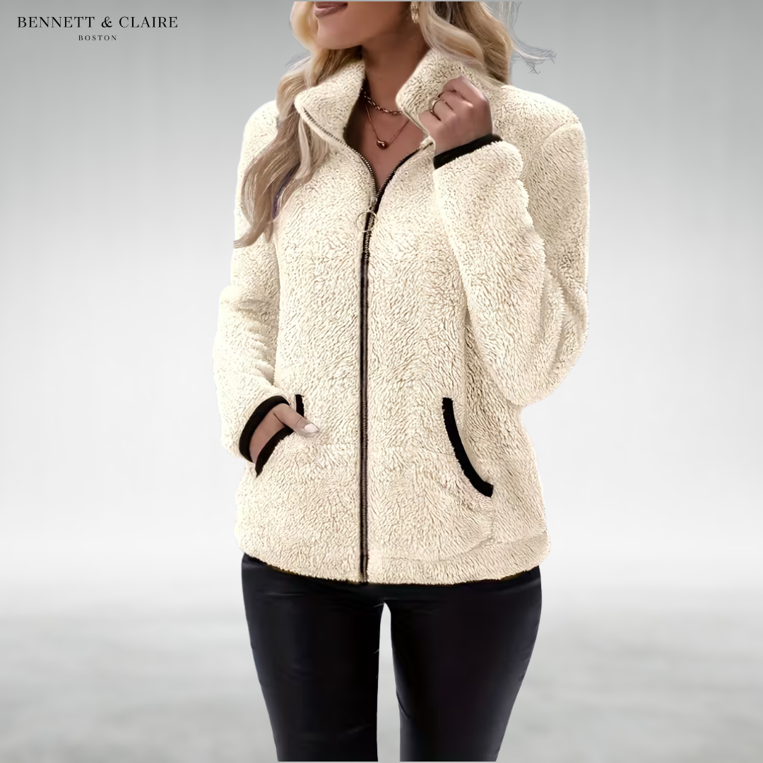 Women's textured fleece jacket with raised collar, zip front and black-trimmed pockets