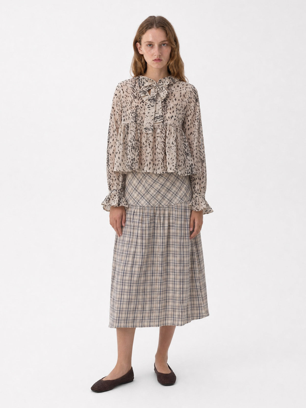 Women's beige animal print blouse with frill collar and long sleeves