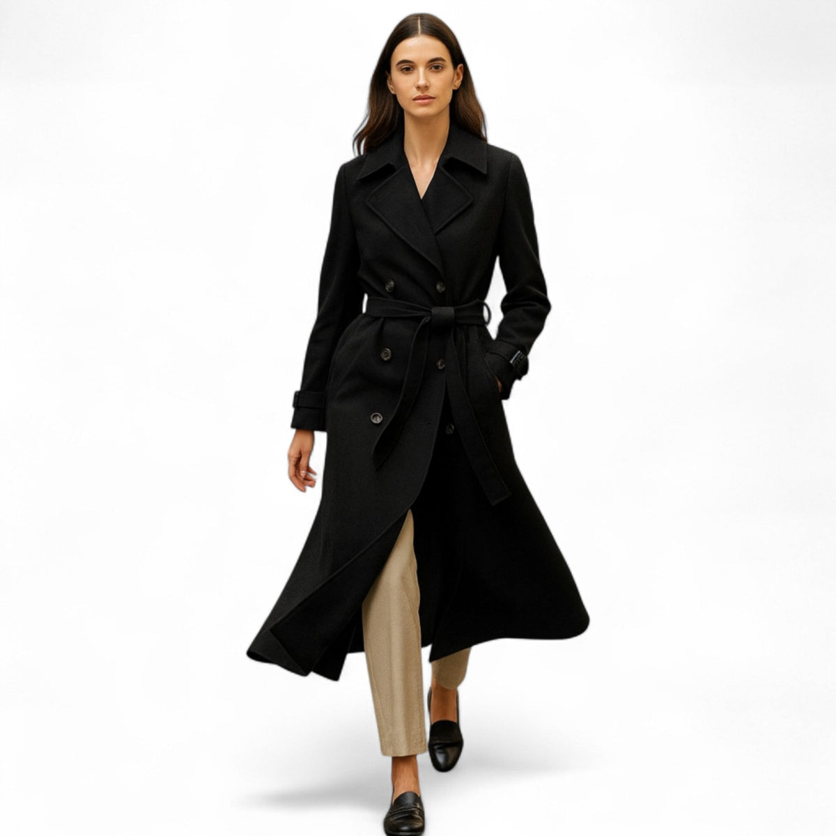 Women's long belted trench coat with wide lapels and adjustable cuff straps