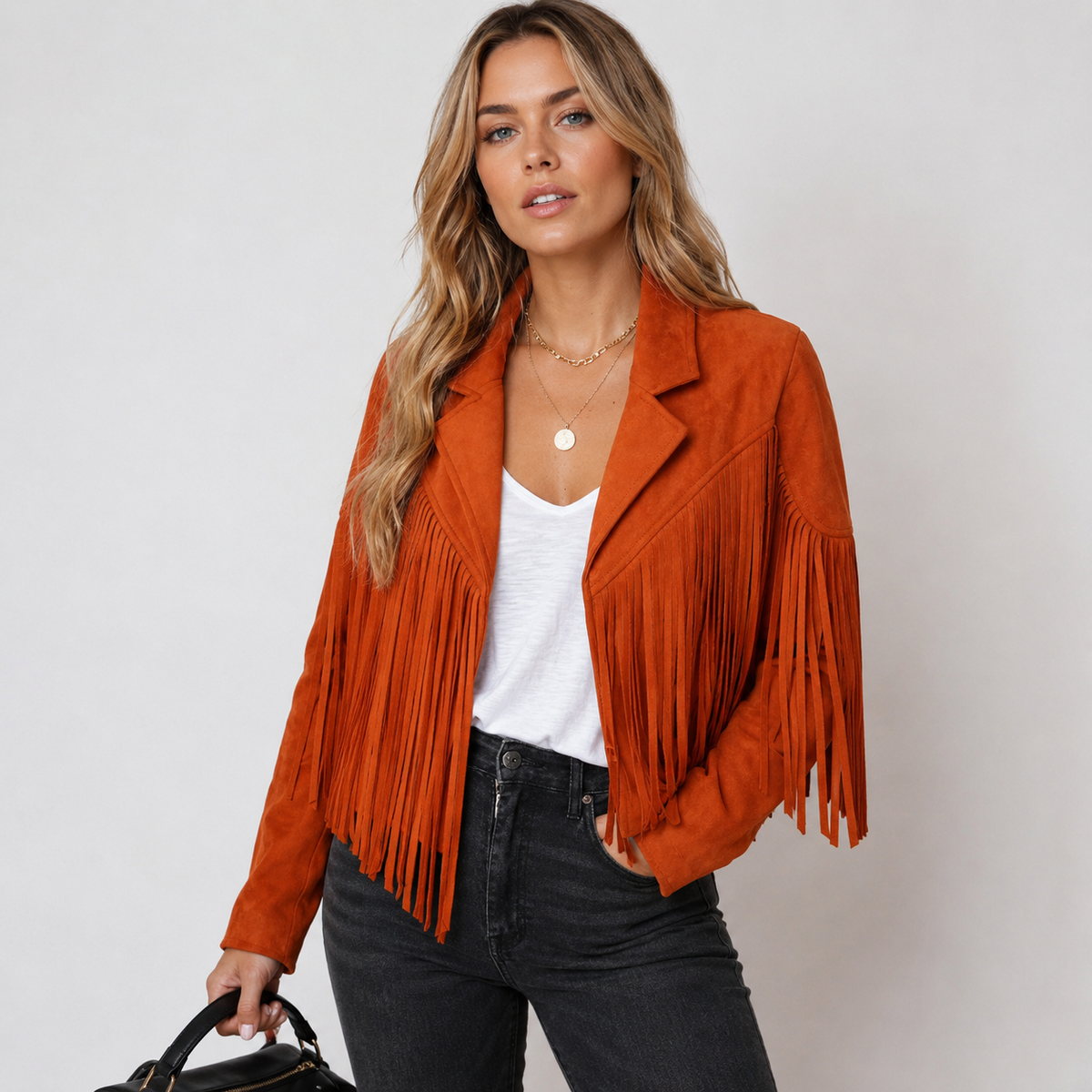 Women's cropped jacket with long fringe panels and notched lapels
