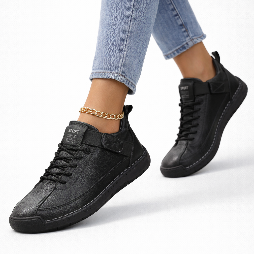 Women's lace-up ankle sneakers with rounded toes, strap detail and flat textured soles