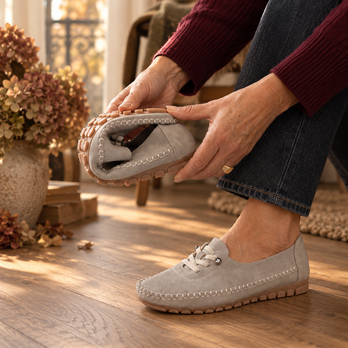 Women's moccasin loafers with lace detail, stitched trim and flat textured soles