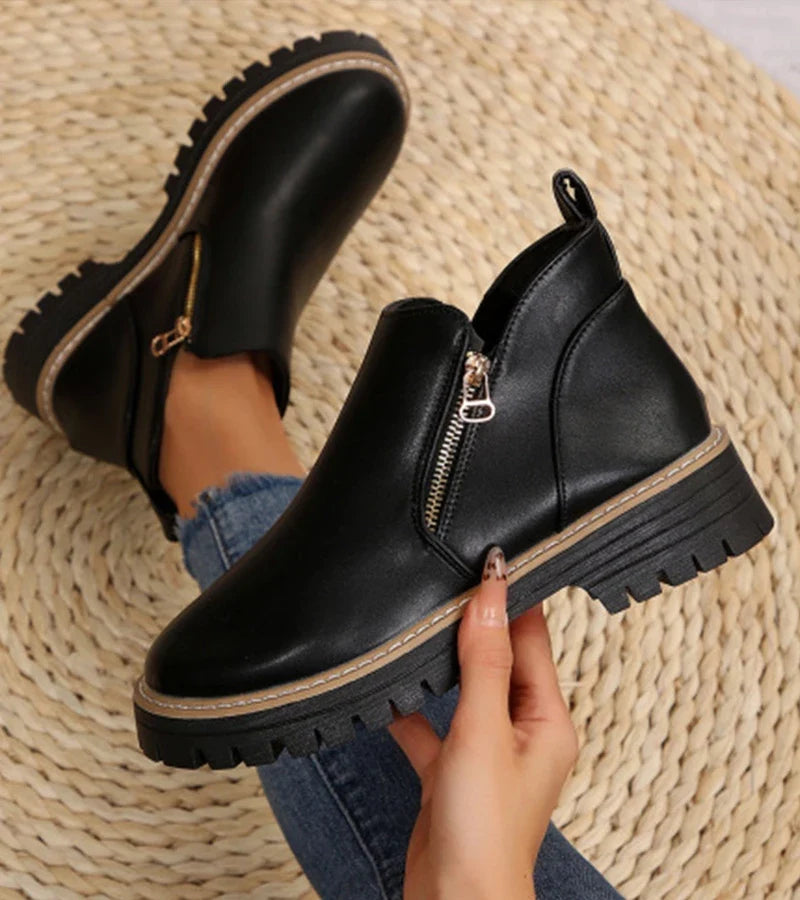 Women's ankle boots with side zips and chunky lug soles