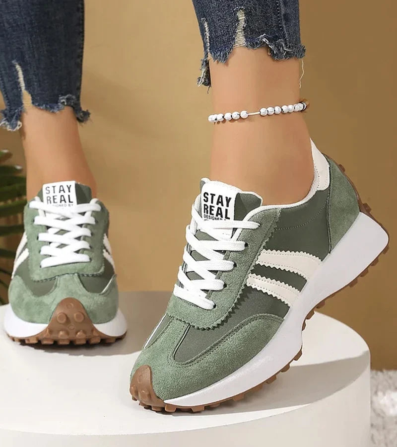 Women's striped lace-up trainers with a round toe and textured flat sole