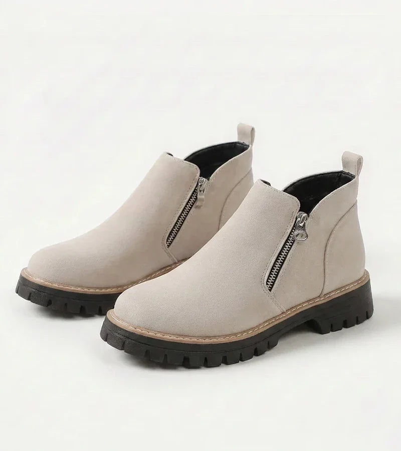 Women's ankle boots with side zips and chunky lug soles