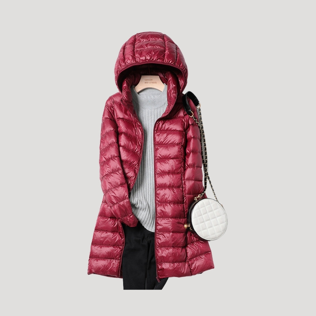 Women's long hooded quilted puffer coat with full zip and lower front pockets