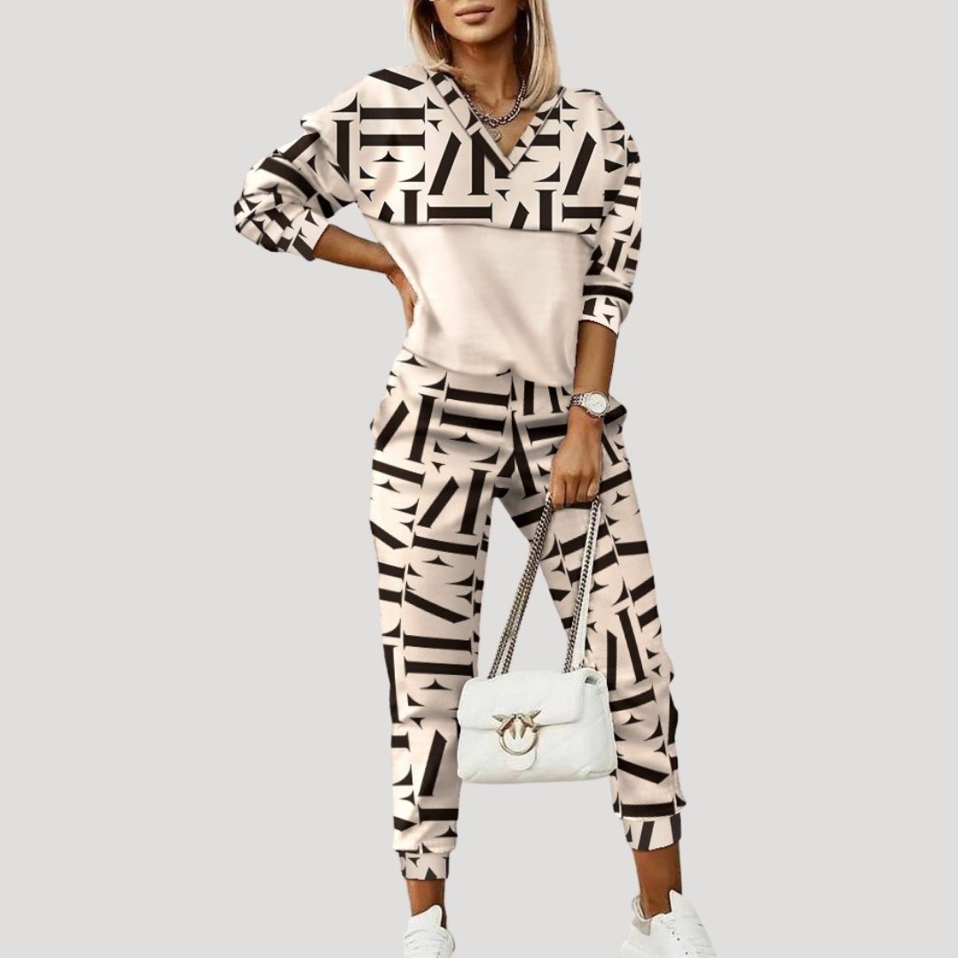 Women's hooded patterned tracksuit set with zip-front top and cuffed jogger trousers