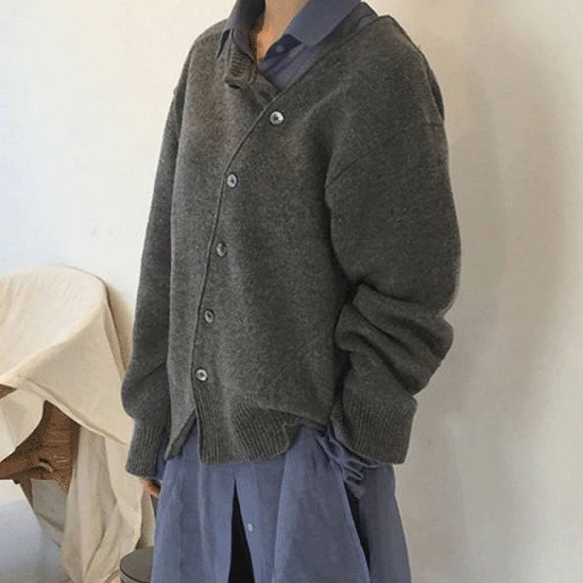 Women's oversized asymmetric button cardigan with long sleeves and ribbed trims