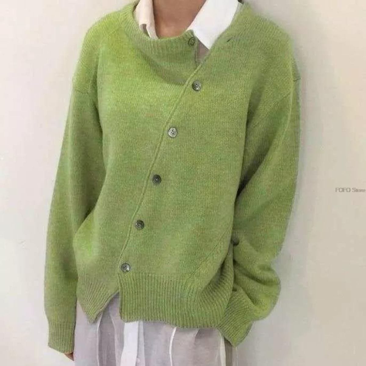 Women's oversized asymmetric button cardigan with long sleeves and ribbed trims