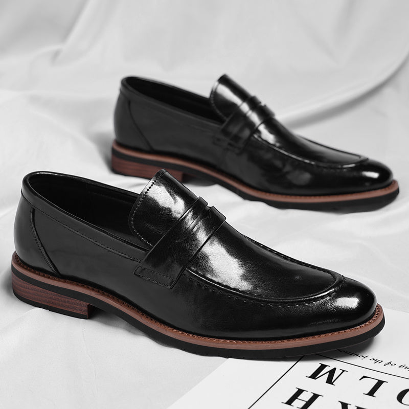 Men's penny loafers with apron toe and low heel