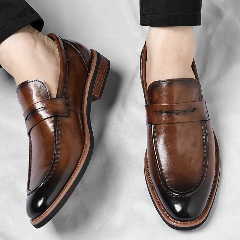 Men's penny loafers with apron toe and low heel