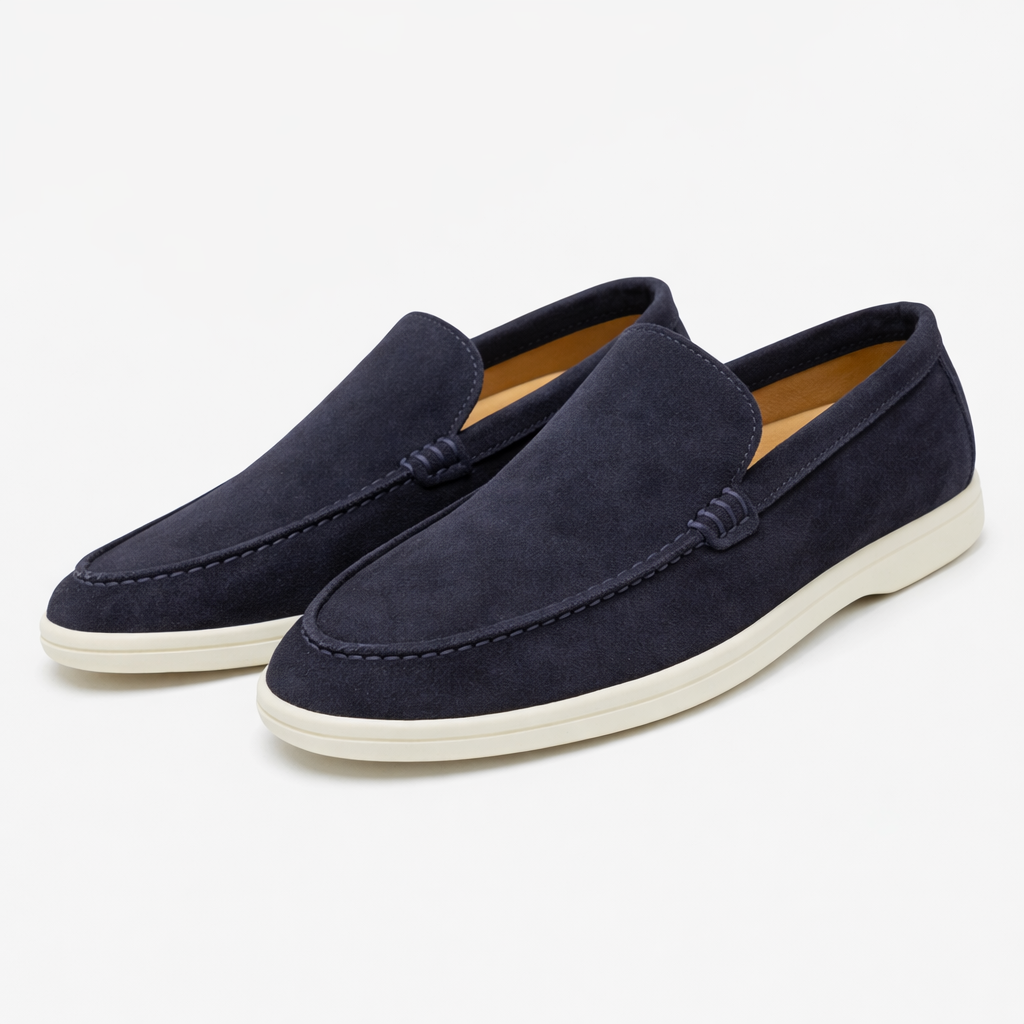 Men's moc toe slip-on loafers with stitched apron detail and low flat soles