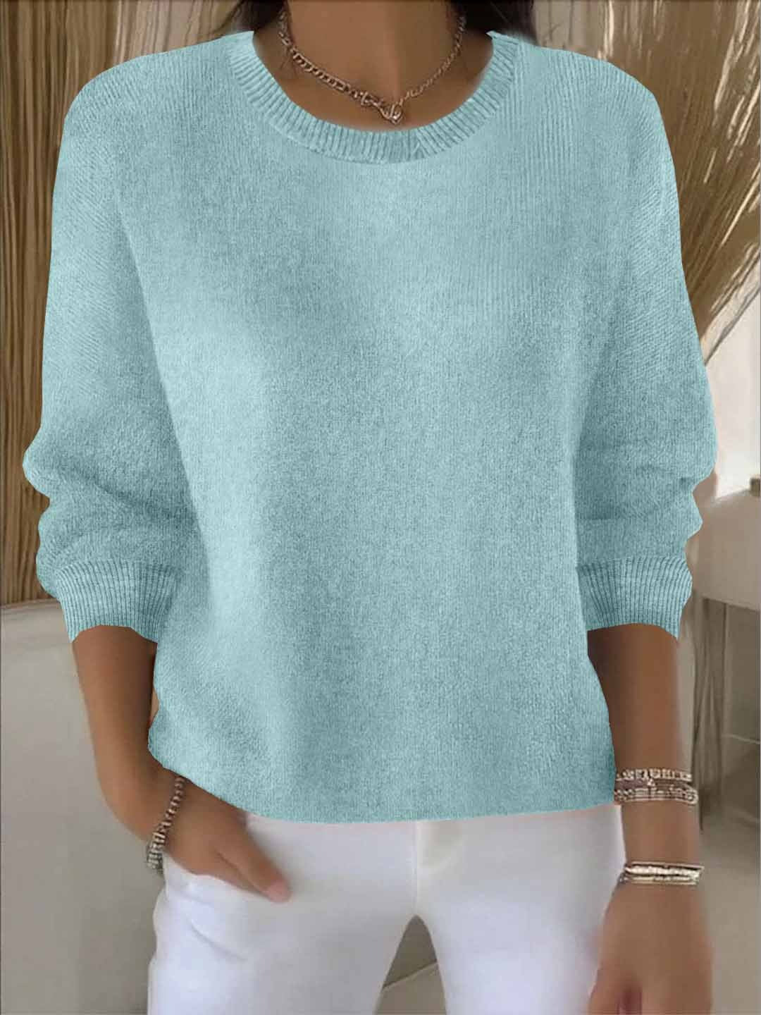 Women's crew neck knitted jumper with long sleeves and ribbed trims