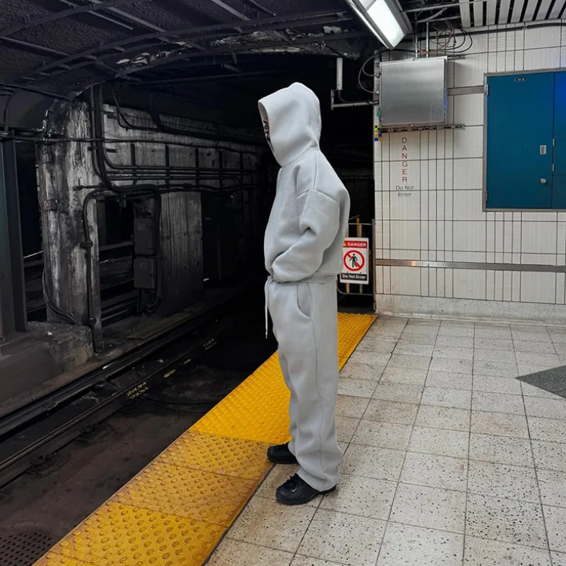 Unisex hooded sweatshirt and jogger set with drawstring trousers