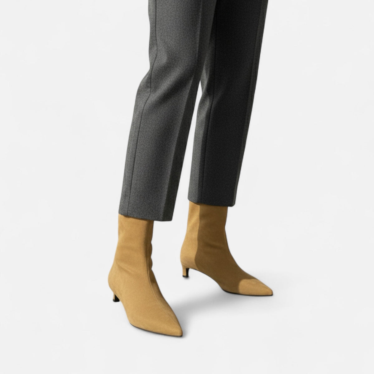 Women's pointed-toe ankle boots with low heels and pull-on shafts