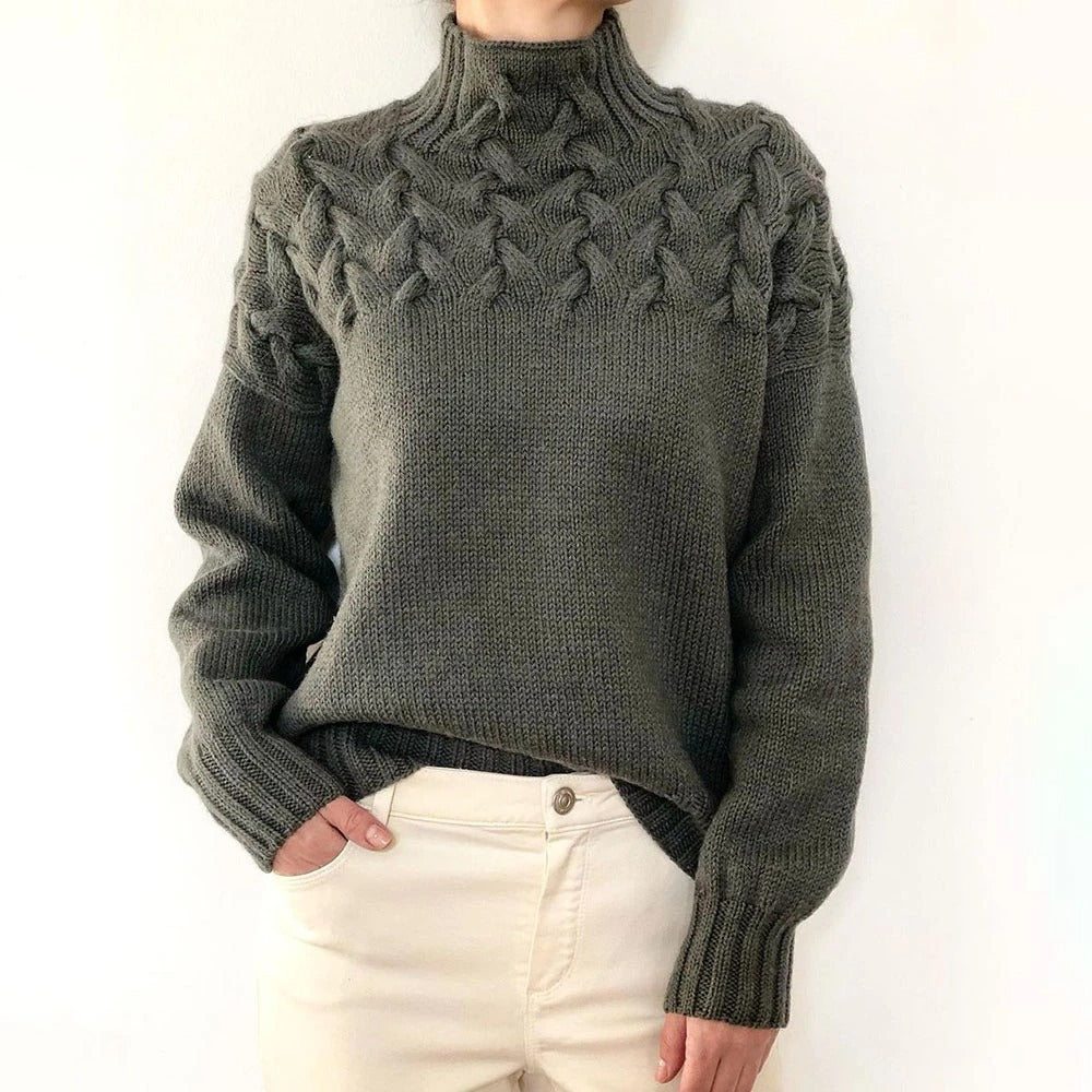 Women's cable-knit turtleneck sweater with long sleeves and ribbed trims