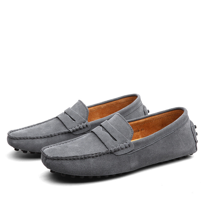 Men's slip-on loafers with moc toe stitching and penny strap detail