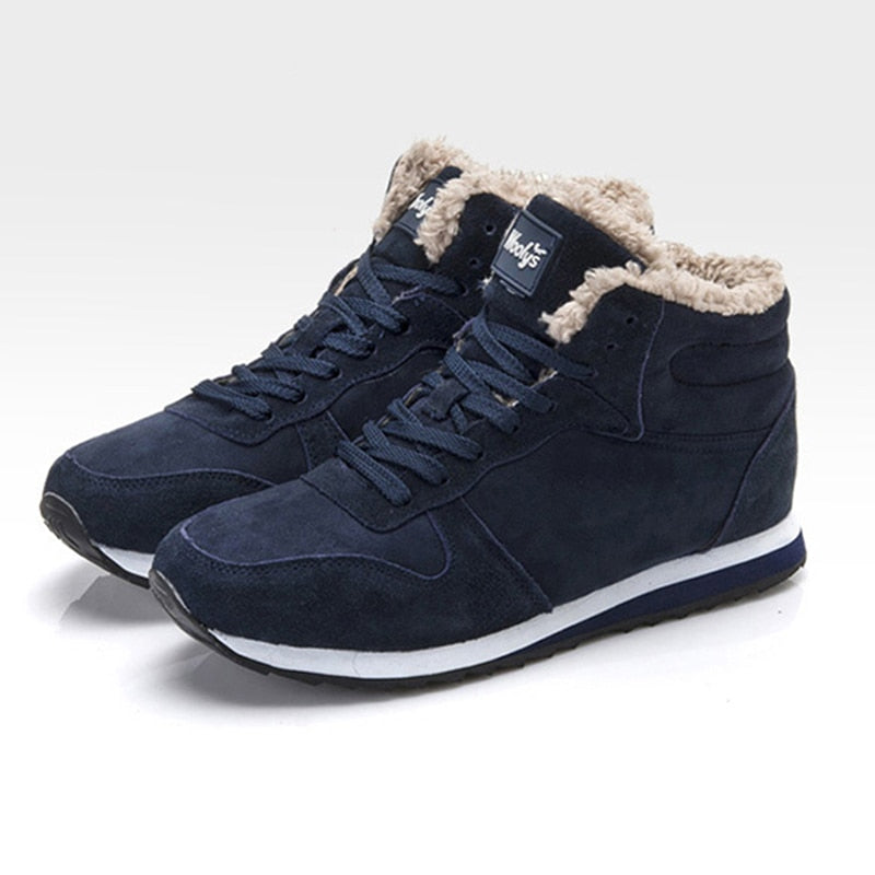 High-top sneaker boots with lace-up fronts, faux-fur collars and contrast soles