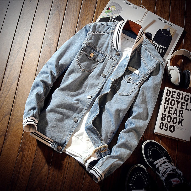 Men's blue denim jacket with stand collar, button front and chest pockets