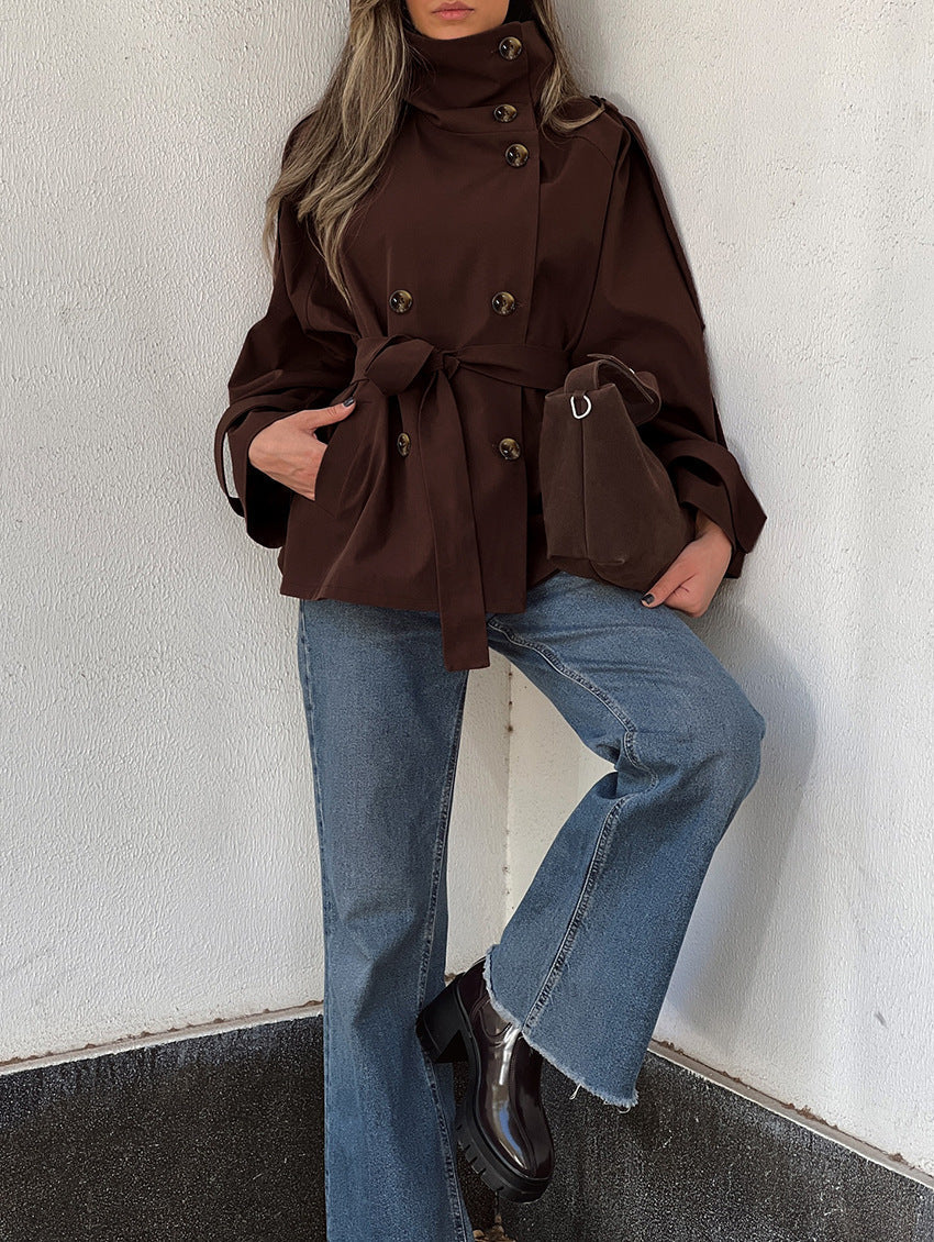 Women's brown double-breasted trench jacket with high collar and waist belt