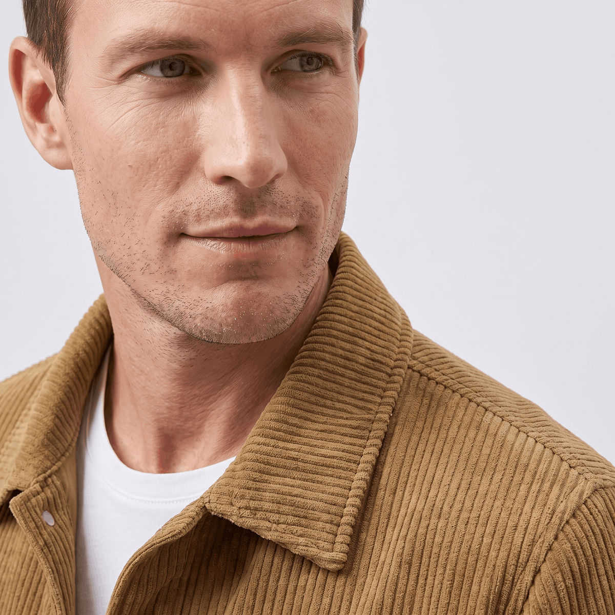 Men's quilted corduroy jacket with snap front, turn-down collar and pockets