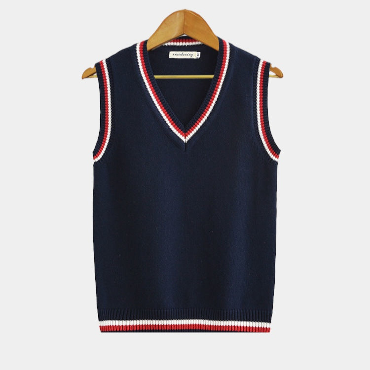Sleeveless cable knit sweater vest with V-neck and striped trim