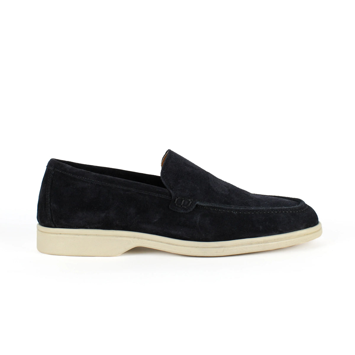 Pair of black men's slip-on loafers with contrasting flat soles