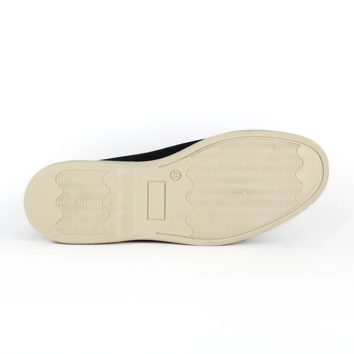 Pair of black men's slip-on loafers with contrasting flat soles