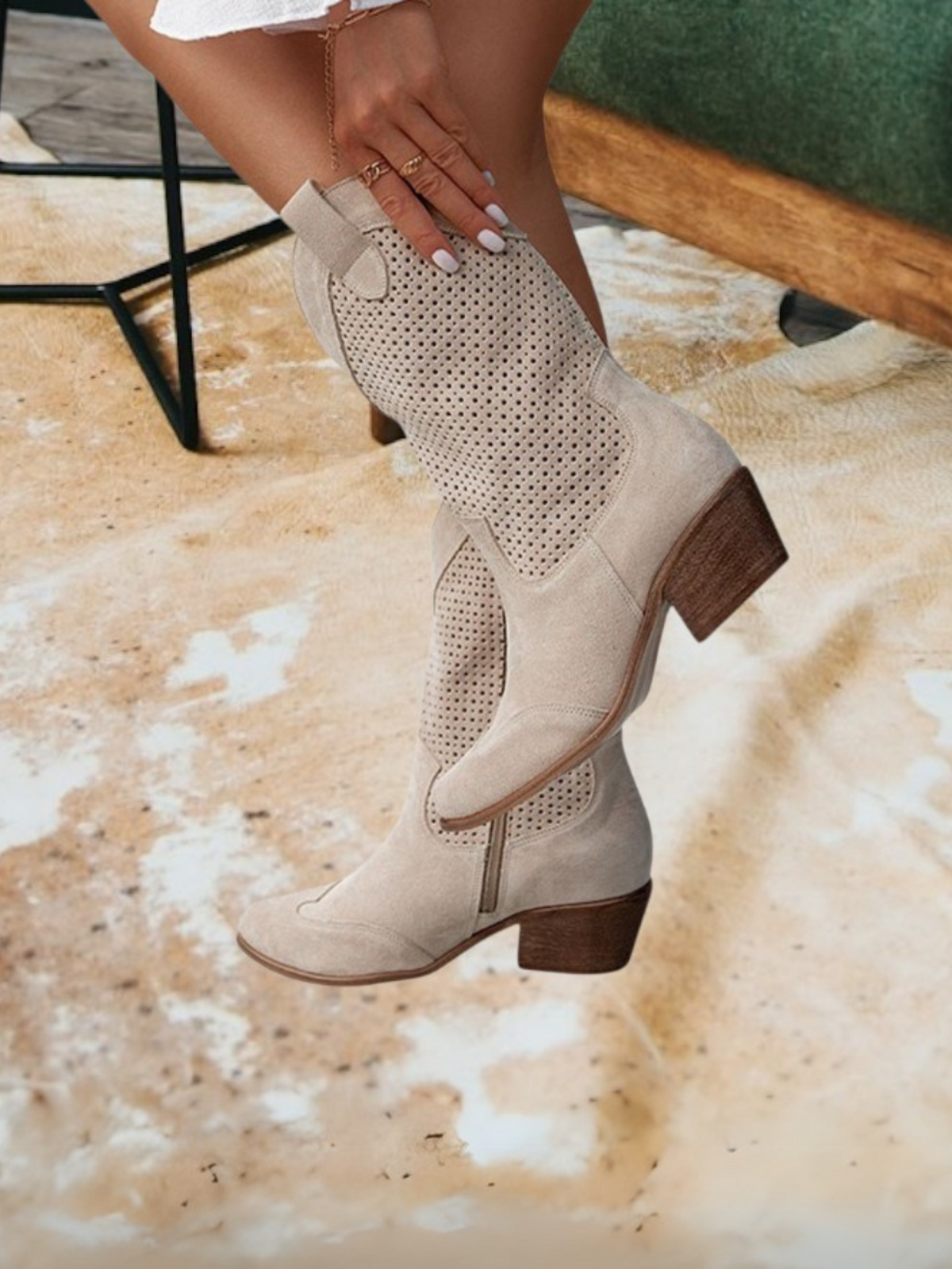 Women's western boots with pointed toes, perforated panels and low block heels