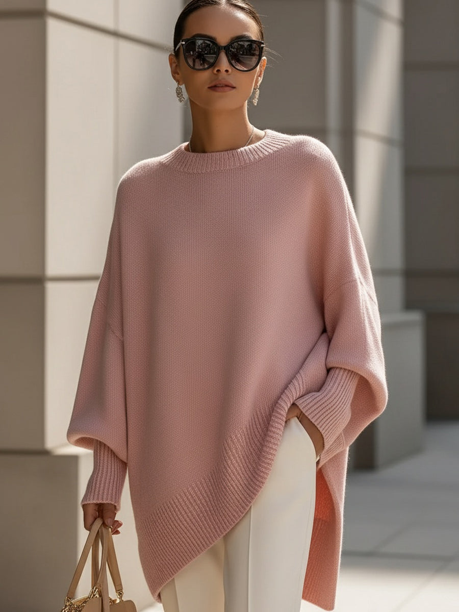 Women's oversized plain crew neck sweater with long sleeves and asymmetric hem