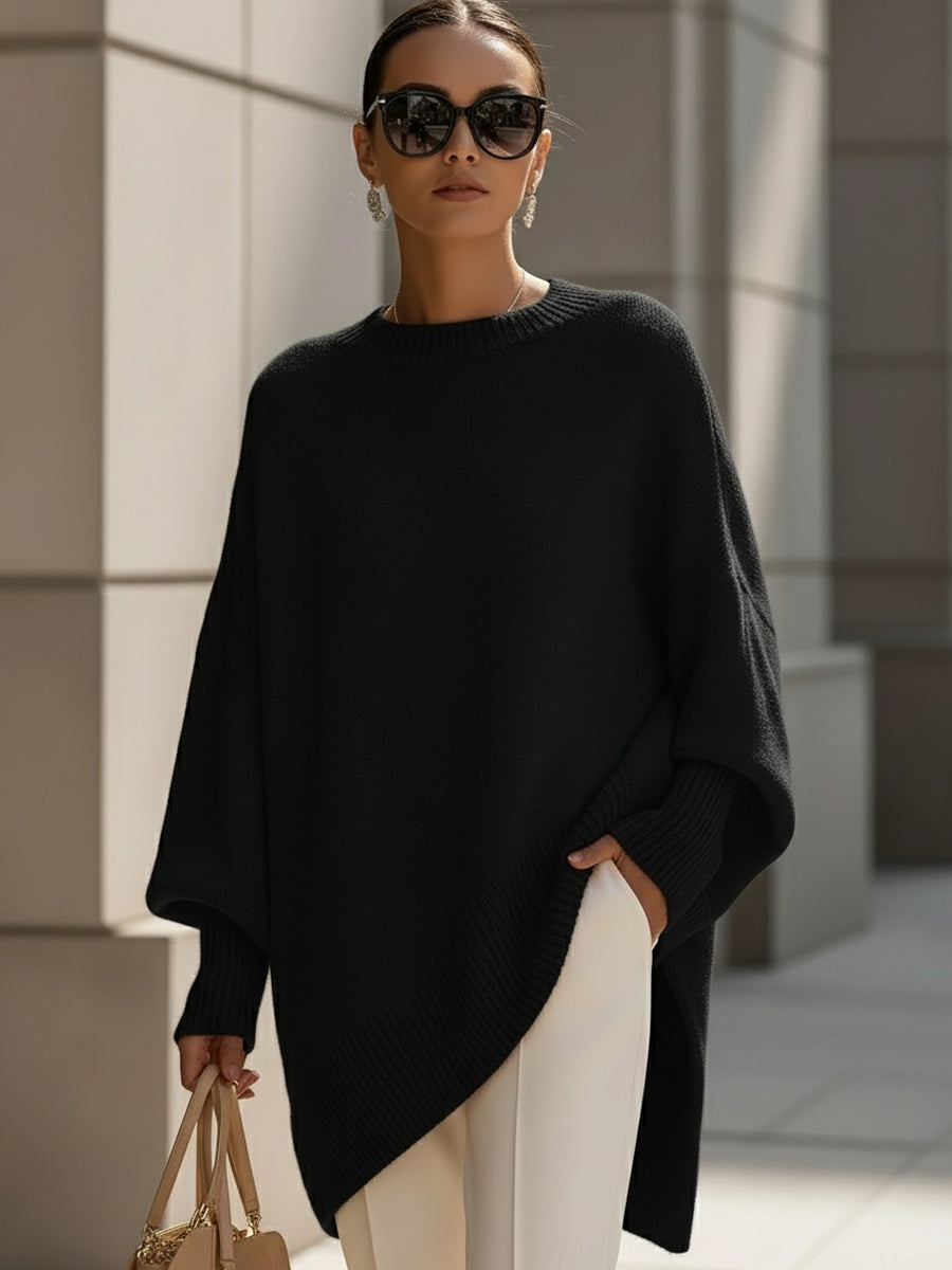 Women's oversized plain crew neck sweater with long sleeves and asymmetric hem