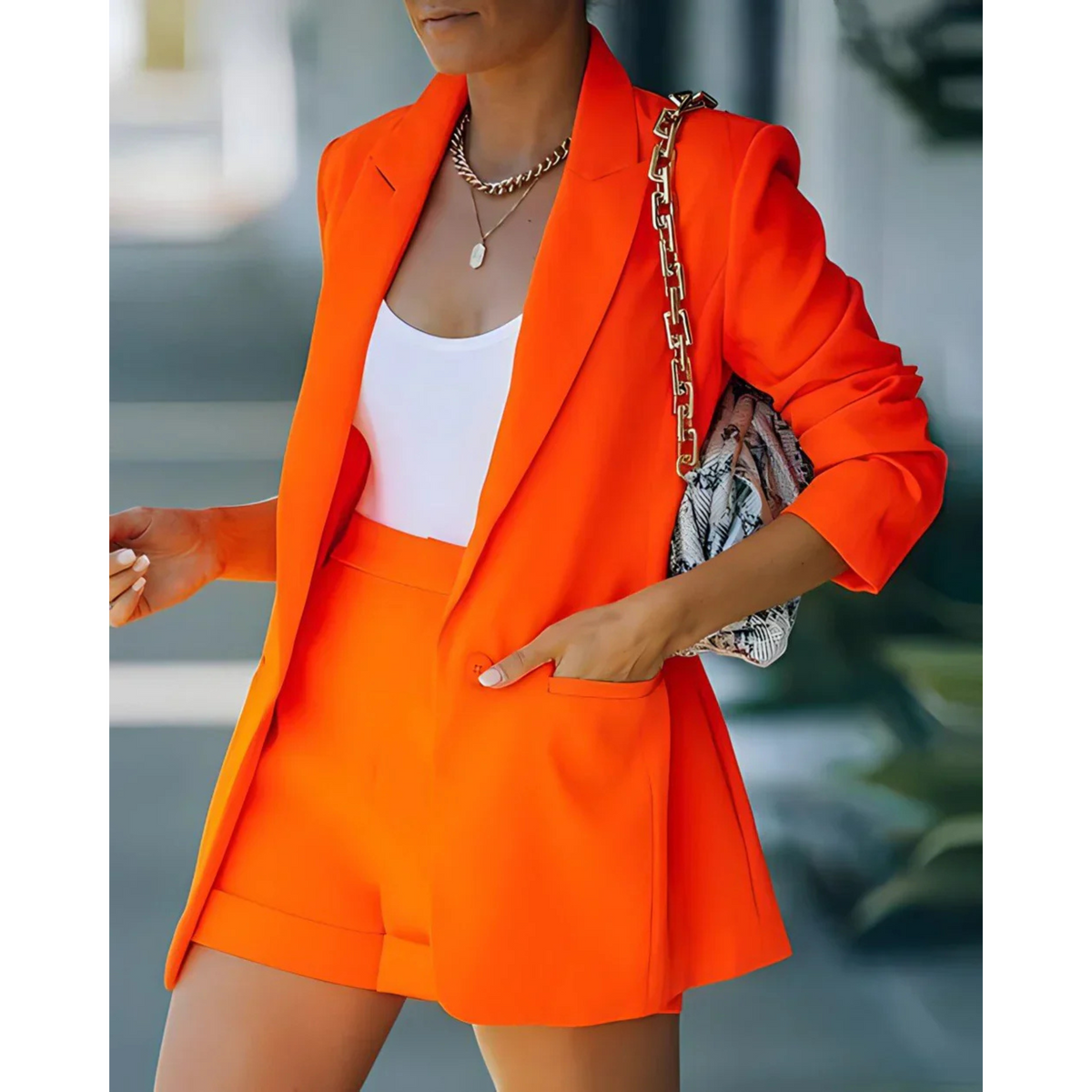 Women's blazer and shorts set with notch lapels and long sleeves