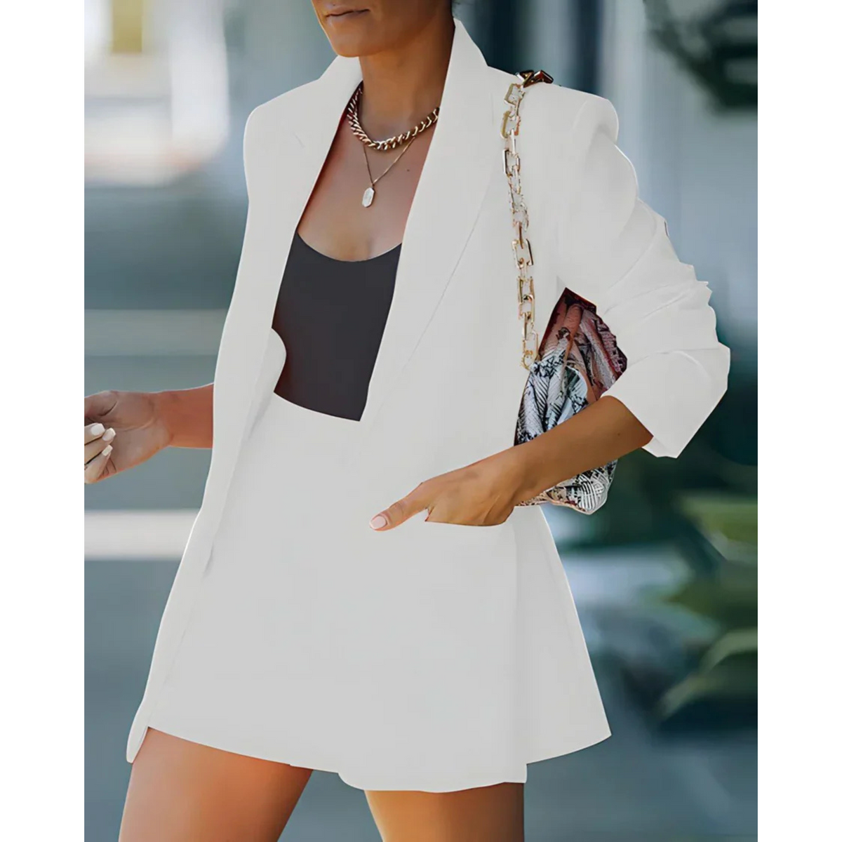 Women's blazer and shorts set with notch lapels and long sleeves