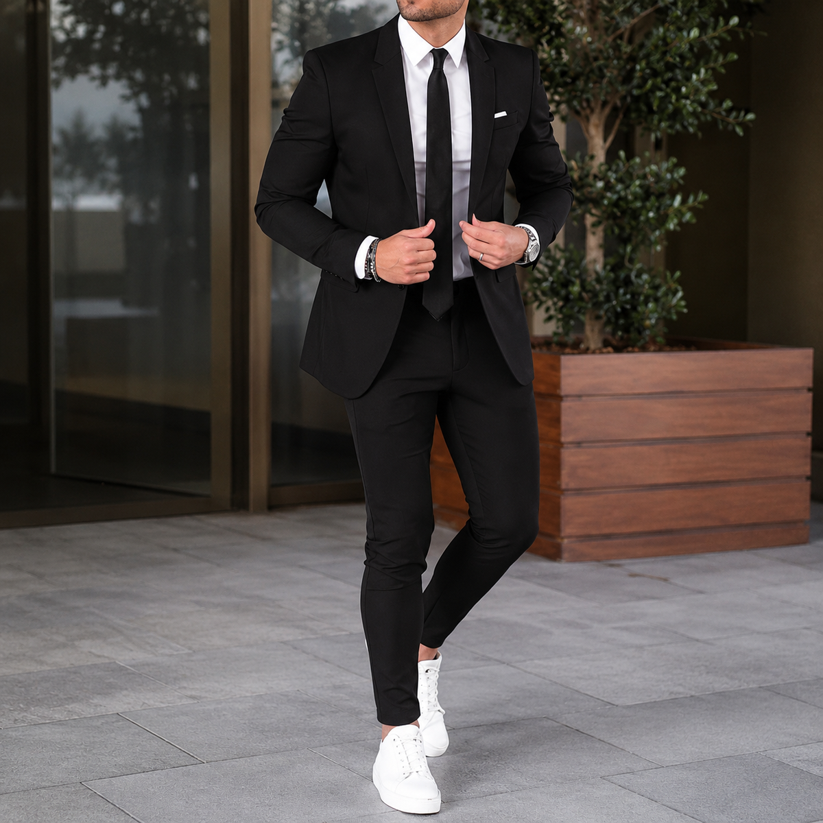 Men's two-piece suit with tailored jacket and slim trousers