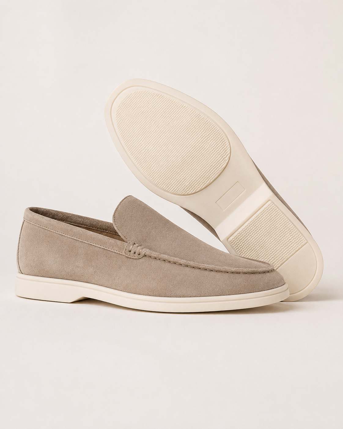 Men's round-toe slip-on loafers with moccasin stitching and low flat soles