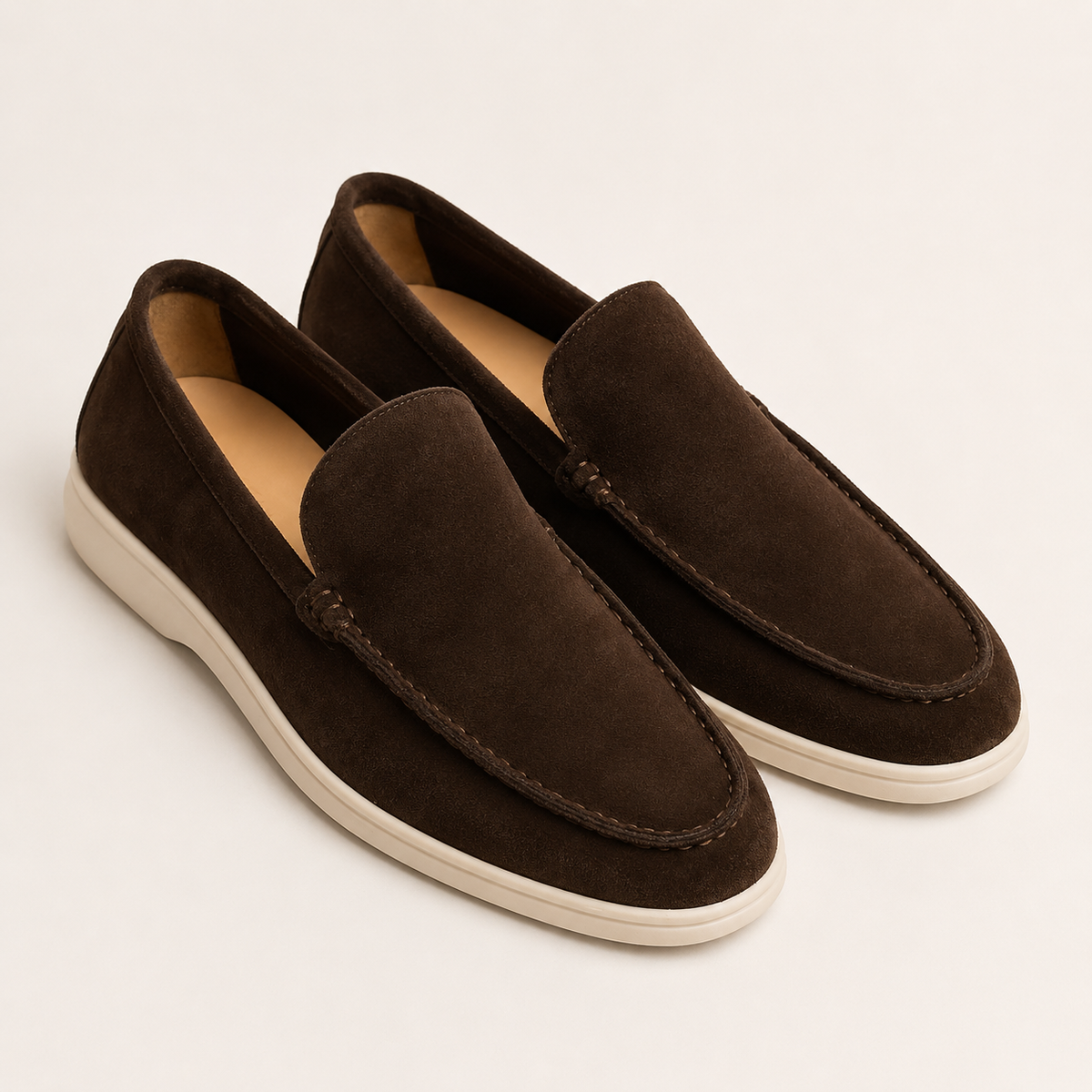 Men's round-toe slip-on loafers with moccasin stitching and low flat soles