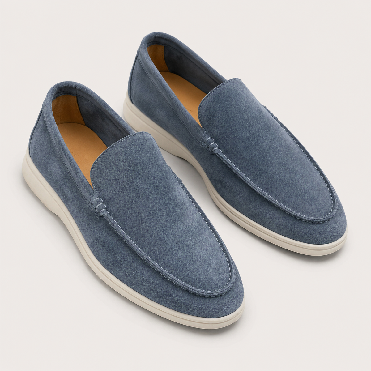 Men's round-toe slip-on loafers with moccasin stitching and low flat soles