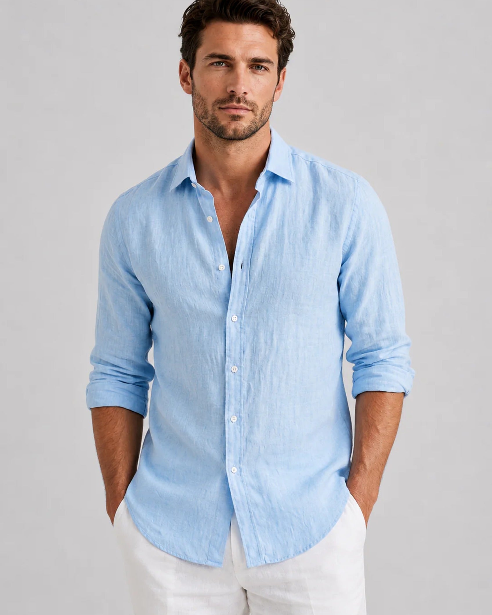 Men's long-sleeve textured button-up shirt with spread collar and curved hem