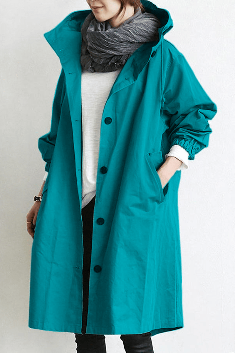 Women's hooded button-front trench coat with long sleeves and side pockets
