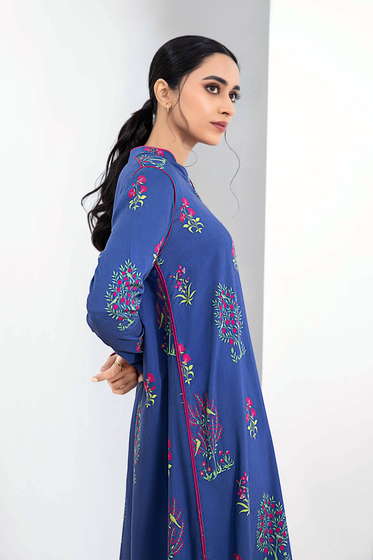 Women's blue floral two-piece suit with long tunic and matching trousers
