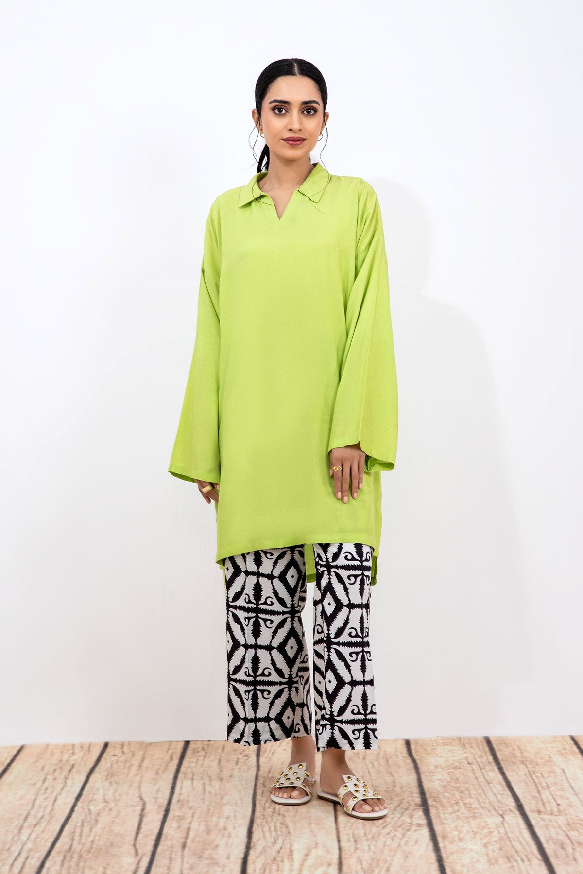 Women's lime green collared tunic with geometric cropped trousers