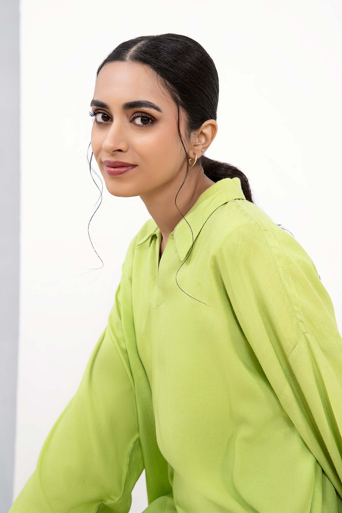 Women's lime green collared tunic with geometric cropped trousers