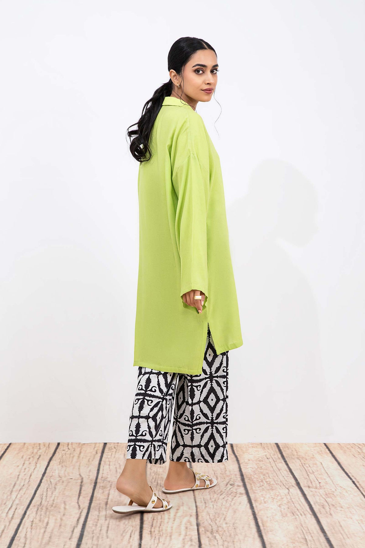 Women's lime green collared tunic with geometric cropped trousers