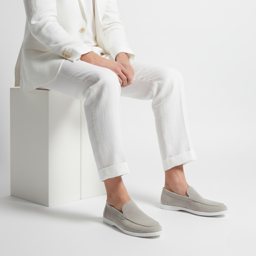 Men's slip-on loafers with rounded toes, textured uppers and flat white soles