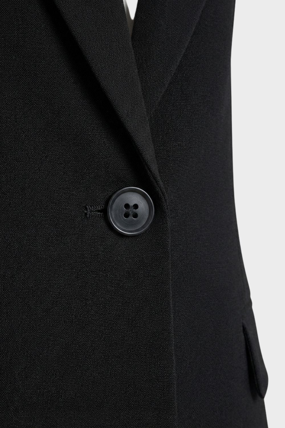 Women's two-piece suit set with notched-lapel blazer and flared trousers