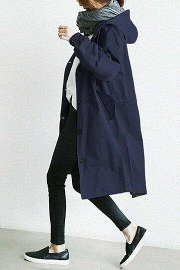 Women's long hooded trench coat with button front and side pockets