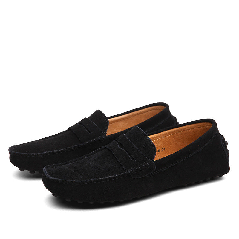 Men's slip-on loafers with moc toe stitching and penny strap detail